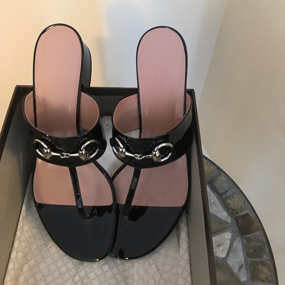 Gucci black patent sandals.